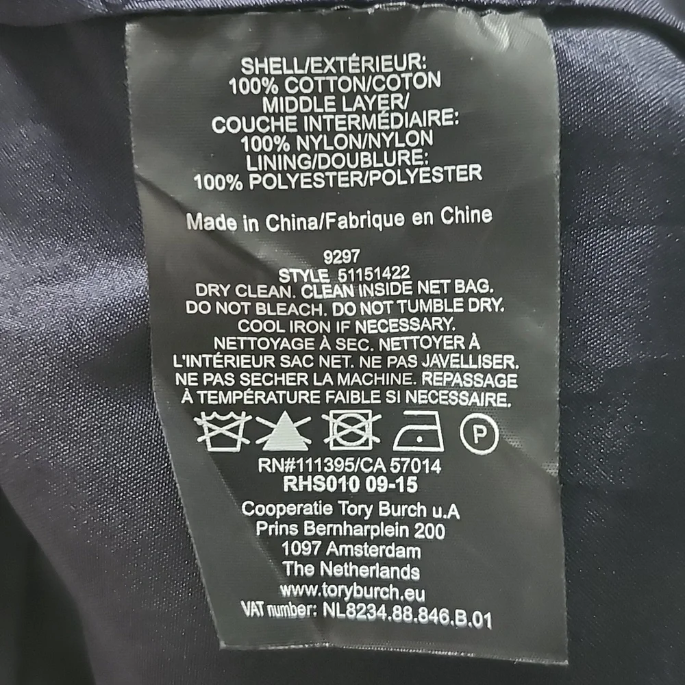 Tory Burch zips back